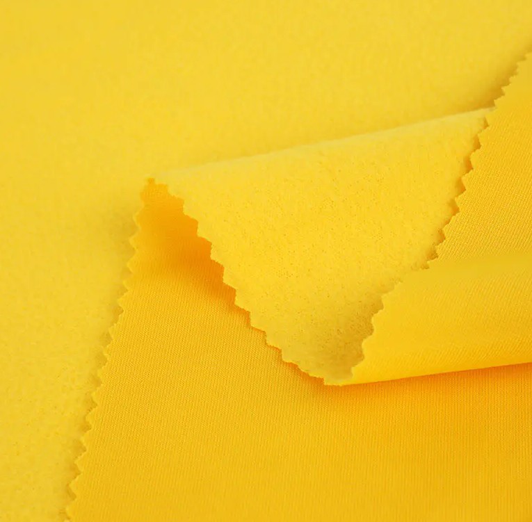 O charme exclusivo do tecido escovado de tricot de tricô super poly